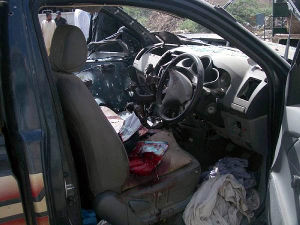 Photo taken on May 18, 2010 shows a damaged police vehicle in the planted bomb blast in northwest Pakistan's Dera Ismail Khan. At least 12 people were killed and 15 injured in the bomb attack targeting a police vehicle on Tuesday.