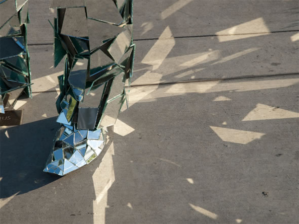 The glass covers of Mirror Man reflect the sunlight in front of the Griffith Observatory of Los Angeles, US, May 19, 2010. 