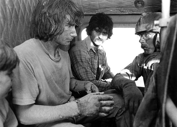 Army National Guard helicopter pilot Harold Kolb rescues two men and their sons from the devastated area around Mount St. Helens.