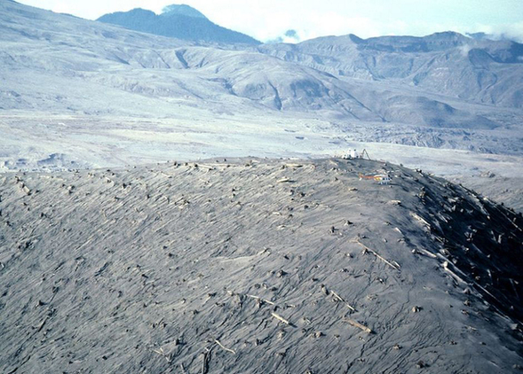 A helicopter rests near measuring instruments on Harrys Ridge on September 30, 1980, five miles north of Mount St. Helens' crater.