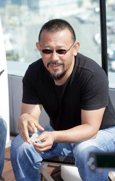 Chinese actor and director Jiang Wen is interviewed on the sidelines of the 63rd Cannes Film Festival in Cannes, France, on May 19, 2010. Jiang's newly-directed film 'Let The Bullets Fly' has premiered its first trailer at the Cannes Film Festival on May 18.