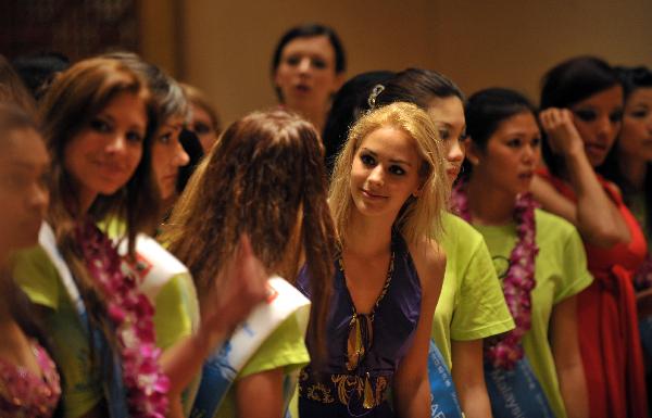 Contestants make debut in Sanya, south China's Hainan Province, May 20, 2010. The 35th Miss Bikini International World Final kicked off Thursday, a total of 64 contestans will take part in the ten-day competition.