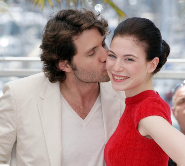 Venezuelian born actor Edgar Ramirez kisses Austrian actress Nora Von Waldstatten during the photocall of 'Carlos' at the 63rd Cannes Film Festival on May 20, 2010.