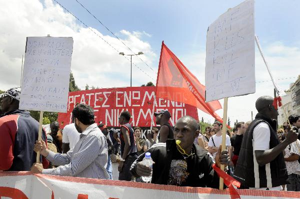 People hold a rally in Athens, capital of Greece, May 20, 2010. [Xinhua]
