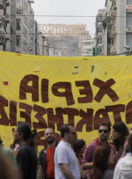 People hold a rally in Athens, capital of Greece, May 20, 2010. [Xinhua]