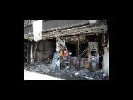 A store is seen after fire in Bangkok, May 21, 2010. [Xinhua] 