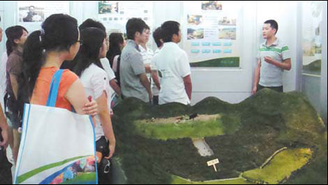 'Environmental envoys' view the design of a landfill in Hangzhou, Zhejiang province. 