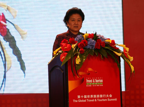 Chinese State Councilor Liu Yandong delivers a speech during the opening ceremony of the 10th Global Travel and Tourism Summit in Beijing on Tuesday, May 25, 2010. [Photo: CRIENGLISH]