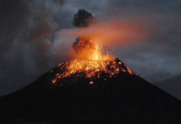 Tungurahua volcano erupts ashes and small stones during an explosion in Cotalo, some 170km south west from Ecuador's capital Quito, on May 29, 2010. Ecuadorian authorities ordered evacuation for thousands of residents near the slopes of the volcano. (Xinhua/Lourdes Robalino) 