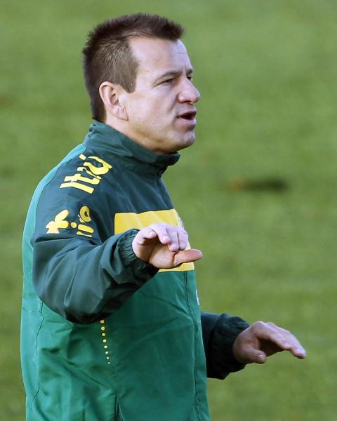 Brazilian national head coach Dunga attends a soccer training session in Johannesburg May 30, 2010.(Xinhua/Reuters Photo)