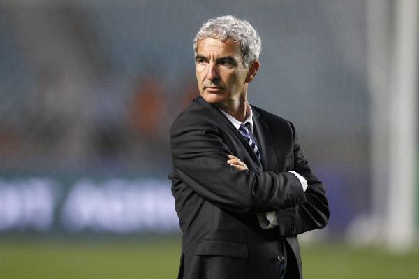 France's coach Raymond Domenech reacts during a friendly soccer match against Tunisia in Rades stadium near Tunis May 30, 2010.(Xinhua/Reuters Photo)