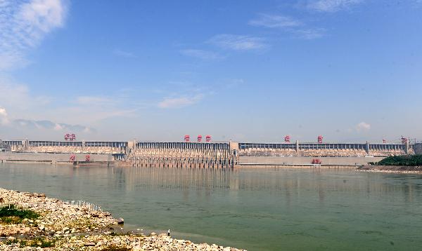 Photo taken on May 30, 2010 shows the facade of the dam of the Three Gorges Water Conservancy Project, in Yichang, central China's Hubei Province. The Three Gorges Reservoir had lowered its water level to 150.40 meters by 8:00 a.m. Sunday from the climax of 171.43 meters during last year's probationary water storage. The water level is to be further lowered to 145 meters by June 10 in a preemptive measure for flood prevention. 