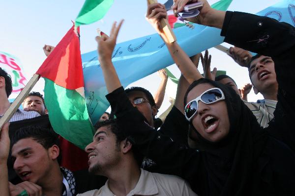 Palestinians take part in anti-Israel rally in Gaza City on May 31, 2010. 