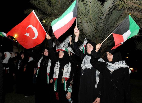 People protest against Israel&apos;s bloody attack on a humanitarian aid flotilla bound for Gaza, in Kuwait City, May 31, 2010. [Xinhua]