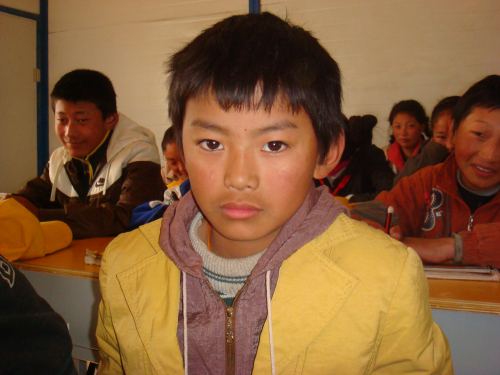 Kelsang, a 12-year-old boy from Gansu Province of China