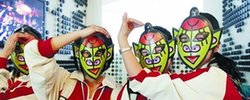 Young visitors wear monkey masks provided by the Czech Pavilion.