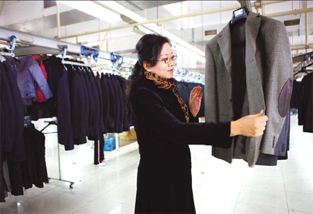 Xia Hua, chairwoman of Eve Enterprise Group, wants to compete with foreign fashion brands by using Chinese elements.
