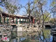 The Former Residence of Soong Ching Ling, late Honorary Chairman of the People's Republic of China, is situated at 46 North Rive Street in the Rear Lake area of the West City District. The residence was once a garden of one of the Qing Dynasty princes' mansions. The area along the banks of Rear Lake is quiet and beautiful, with shady willow trees lining the streets. [Photo by Jia Yunlong]