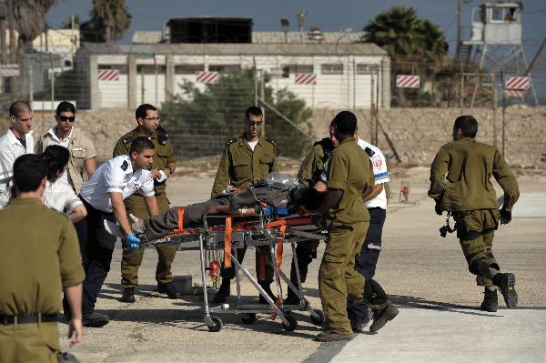 An injured person is evacuated to Rambam hospital in the northern city of Haifa, Israel, May 31, 2010. Clash happened on Monday morning between an international Gaza aid flotilla and Israeli navy, causing at least 10 casualties, Israeli military confirmed. (Xinhua) 