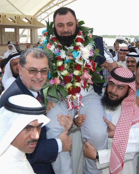 Kuwaiti Pro-Palestinian activists, who were detained aboard the Gaza-bound flotilla raided by Israel on May 31, 2010, arrive at the Kuwait international airport in Kuwait City on June 2, 2010. Israel deported all of the Gaza aid flotilla activists on Wednesday. [Xinhua]