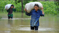 Heavy rain in Guangxi damages houses, crops