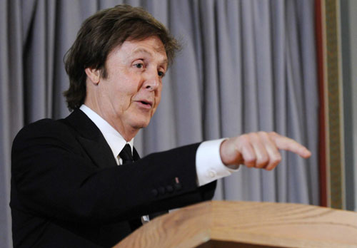 Paul McCartney makes a point during a news conference introducing him as the winner of the Gershwin Prize for Popular Song at the Library of Congress in Washington, June 1, 2010.