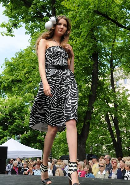 A model displays the Marimekko's summer outfit on an outdoor stage in central Helsinki, capital of Finland, June 2, 2010.