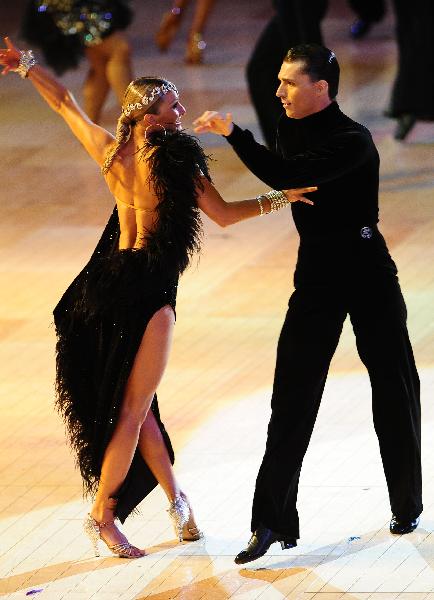 Dancers perform during the Professional Latin Championship of Blackpool Dance Festival in Blackpool, Britain, June 2, 2010. The 85th Blackpool Dance Festival is held here from May 27 to June 4, attracting over 2,600 pairs of top international standard dancers to its prestigious championships.