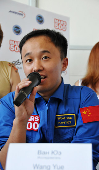 Wang Yue from China, a participant of the simulated Mars expedition, speaks in Moscow, capital of Russia, June 3, 2010. [Xinhua]