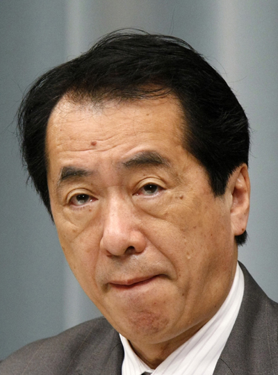 Japanese Finance Minister Naoto Kan holds a news conference in Tokyo in this April 30, 2010 file photo. [Xinhua] 