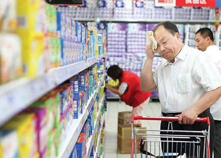 A man shops at a supermarket in Beijing on Friday.