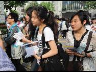 During China's 2010 college entrance exam, which is held from June 7 to 8, more than 9.57 million students will vie for 6.57 million places at the country's universities or colleges. [Xinhua]