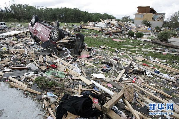 Photo shows the aftermath of tornados that battered the mid-west state, June 6, 2010. From about 11 p.m. on June 5 local time, at least five hurricanes, along with storms, attacked Ohio. At least seven people were killed. The hurricanes also destroyed many office and residential buildings, as well as schools. [news.cn]