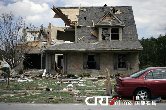 Photo shows the aftermath of tornados that battered the mid-west state, June 6, 2010. From about 11 p.m. on June 5 local time, at least five hurricanes, along with storms, attacked Ohio. At least seven people were killed. The hurricanes also destroyed many office and residential buildings, as well as schools.[cri.cn]