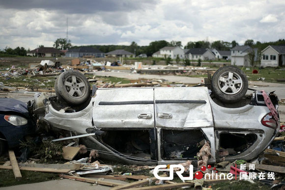 Photo shows the aftermath of tornados that battered the mid-west state, June 6, 2010. From about 11 p.m. on June 5 local time, at least five hurricanes, along with storms, attacked Ohio. At least seven people were killed. The hurricanes also destroyed many office and residential buildings, as well as schools.[cri.cn]