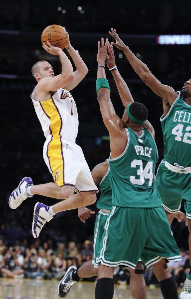 Boston Celtics beat host Los Angeles Lakers 103-94, drawing the best of seven series 1-1 at the 2010 National Basketball Association finals Sunday in Los Angeles. (Xinhua Photo)