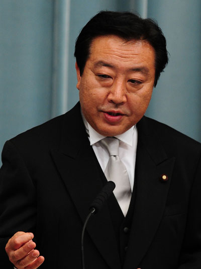 Japan&apos;s new Finance Minister Yoshihiko Noda meets the press at the official residence of new Prime Minister Naoto Kan in Tokyo, capital of Japan, June 8, 2010. [Xinhua]