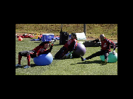 Mexico's national soccer team goalkepeers Oscar Perez (R), Luis Michel (C) and Guillermo Ochoa stretch during a practice session at a training camp outside Johannesburg June 7, 2010. [China Daily/Agencies]