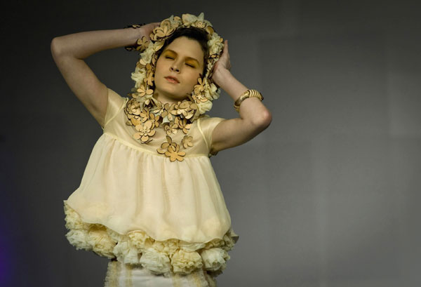 A model presents a creation designed by a graduate of the Institute of Textiles and Clothing during a graduate fashion show in Hong Kong, south China, June 9, 2010.