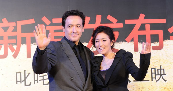 Cast members John Cusack and Gong Li promote the WWII spy thriller 'Shanghai' at the film's global premiere in Beijing on Thursday, June 10, 2010. The film also stars Chow Yun-Fat and Ken Watanabe. It will open in China on June 17.