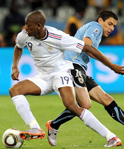 during a group A match of the 2010 FIFA World Cup at Soccer City stadium in Soweto, suburban Johannesburg, on June 11, 2010. 