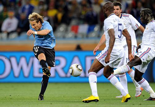 during a group A match of the 2010 FIFA World Cup at Soccer City stadium in Soweto, suburban Johannesburg, on June 11, 2010. [Xinhua]