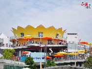 The Dutch Pavilion is decorated in yellow and orange, the traditional colour to represent the Netherlands. [Photo by Pierre Chen] 