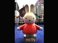 The Miffy figure posed outside the Dutch Pavilion, attracts tourists who want photos taken wish it. 