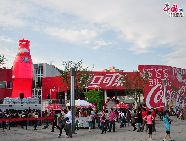 The Coca Cola Pavilion situated in the west bank of the Huangpujiang River. Coca Cola Pavilion is one of the most visited enterprise pavilions in Shanghai Expo 2010. [Photo by Pierre Chen]
