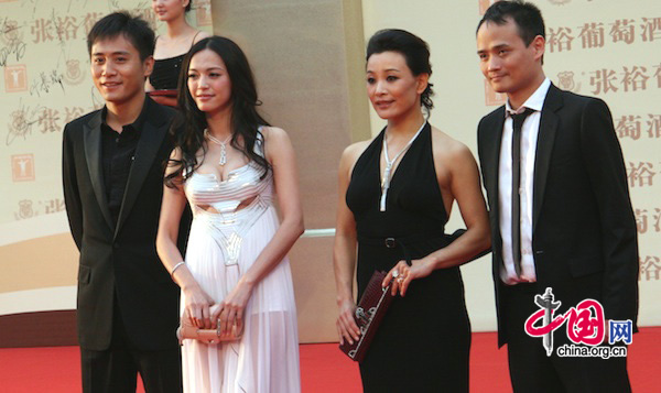 Chinese actors, from left to right, Liu Ye, Yao Chen and Joan Chen arrive at Shanghai Grand Theatre for the opening of the 13th Shanghai International Film Festival on June 12, 2010.