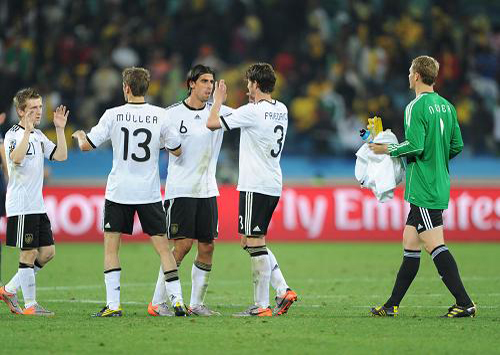 Players of Germany celebrate their victory after beating Australia 4-0 in the 2010 World Cup Group D match at the Moses Mabhida Stadium on Sunday. [Xinhua]