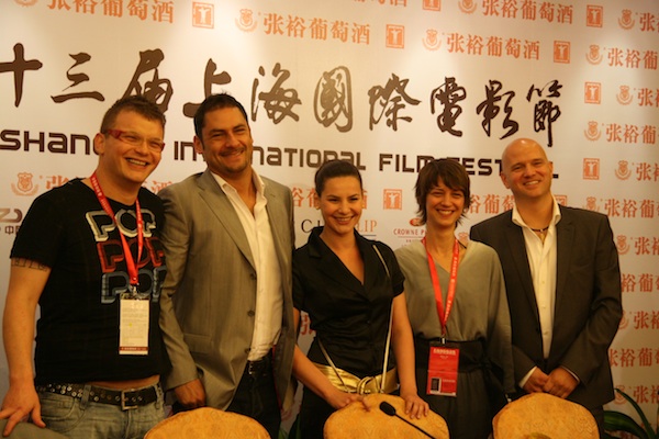 The crew members of the Hungarian movie Czukor Show, from left to right, director Tamas Domotor, leading actor Attila Arpa, leading actress Kata Peter, producer Inez Matis and producer Perenc Pusztai attend a press conference at the Shanghai Film Art Center on June 14.
