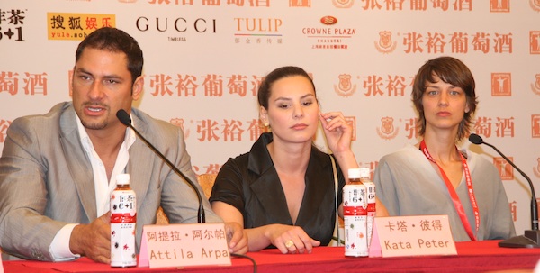 Attila Arpa, (first from the left) the leading actor of the Hungary movie, Czukor Show, speaks at a press conference at the Shanghai Film Art Center on June 14.