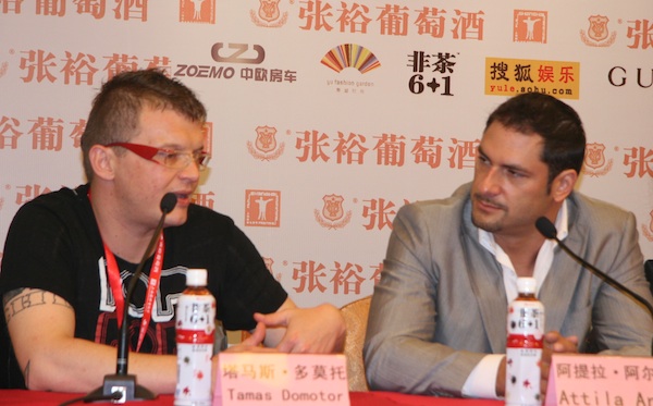 Hungarian director Tamas Domotor (first from the left) speaks at a press conference for his movie Czukor Show at the Shanghai Film Art Center on June 14.